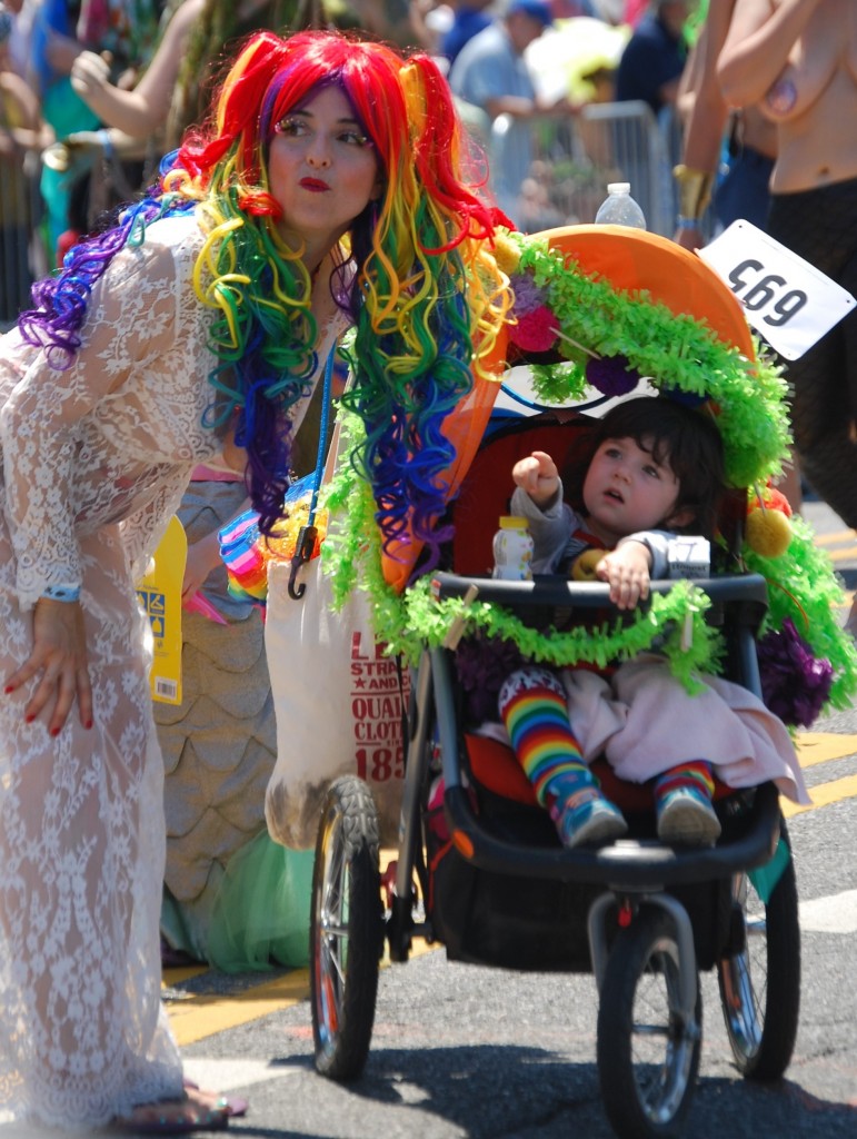 rainbow-lady-and-kid-mermaid-parade