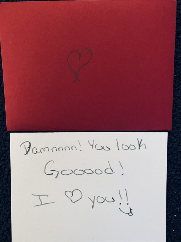 note that says, "Damn, you look good! I love you!"