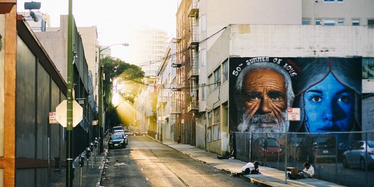 Sunbeams shine down a San Francisco alleway.