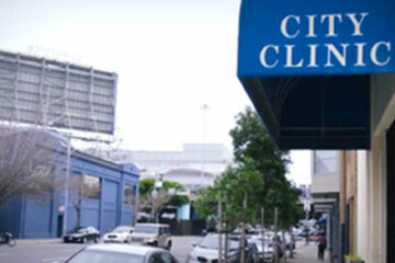 The blue awning of San Francisco City Clinic, located at 356 7th Street in the South of Market neighborhood.