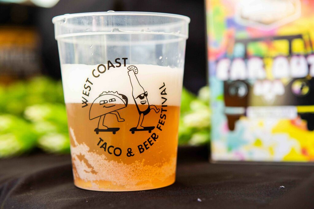 West Coast Taco and Beer Festival cup with beer in it.